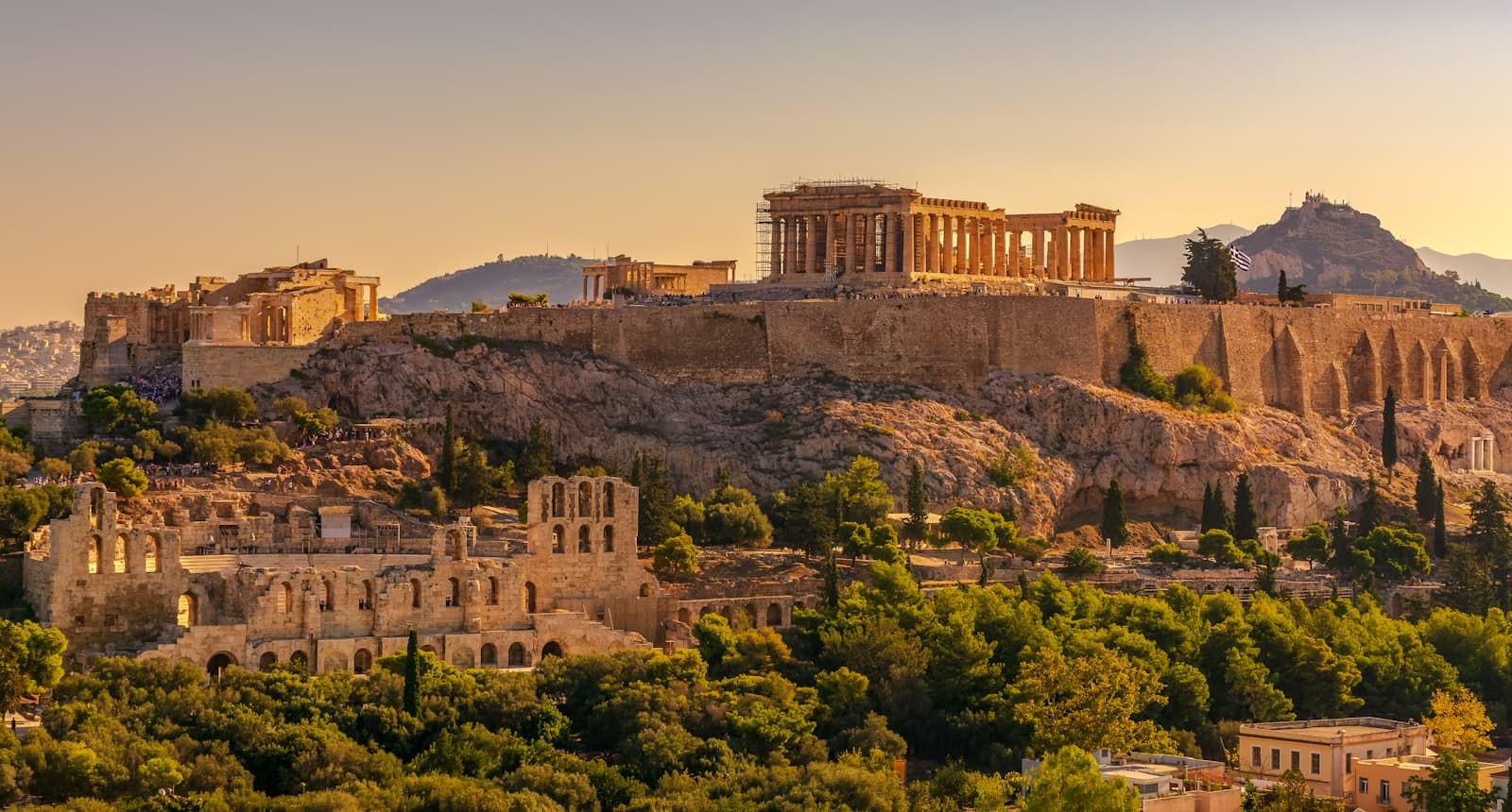 A golden capital of monuments and temples crowning a sunlit hill.
