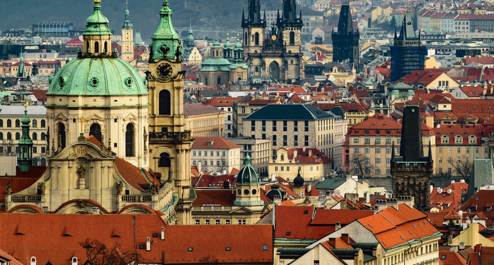 A vast living realm of spires, domes, and rooftops stretching to the horizon.